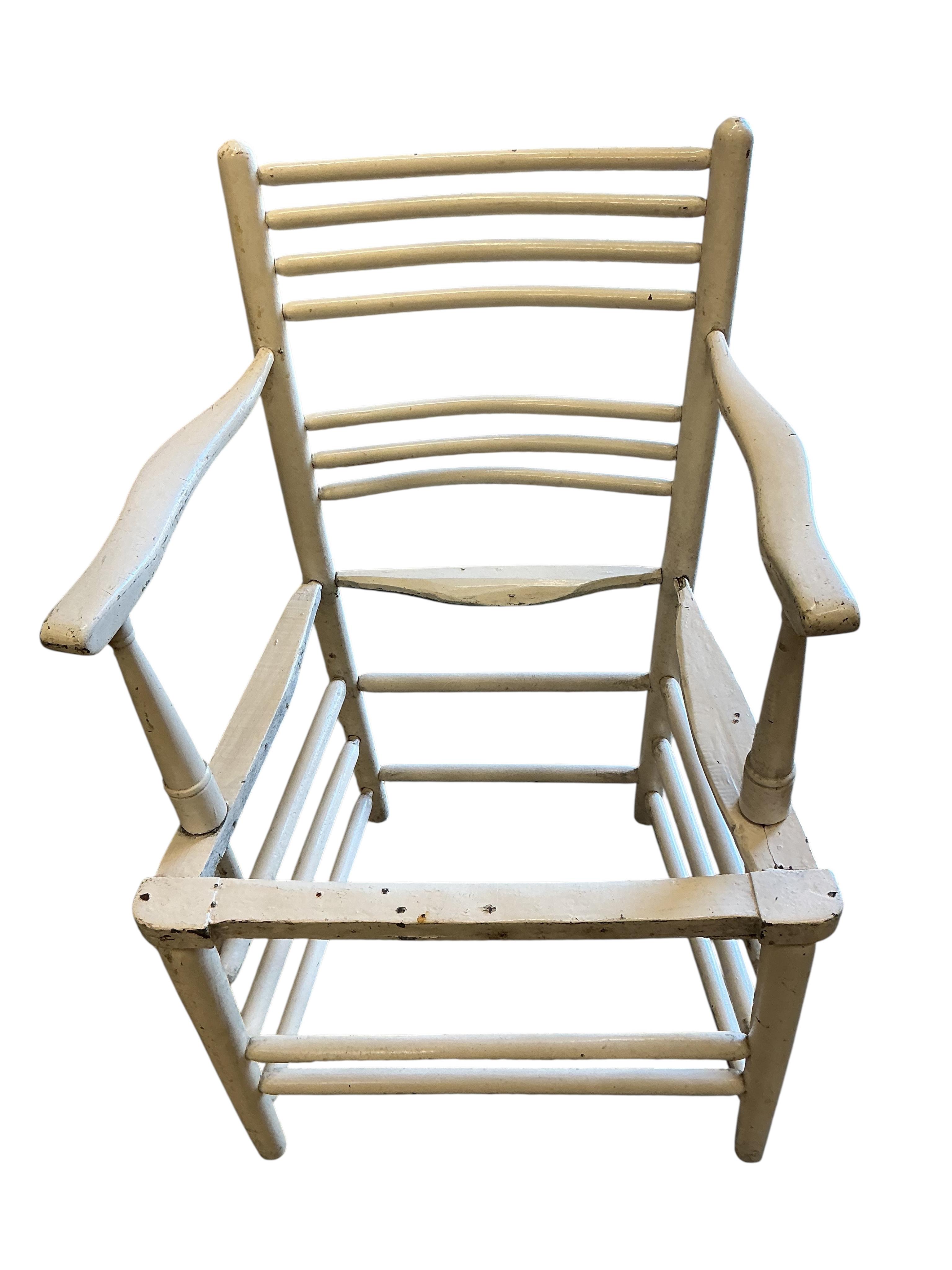 Six 19th century and later Sussex elbow chairs, in need of restoration